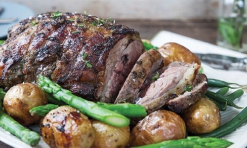 Roasted Herbed Leg Of Lamb With New Potatoes